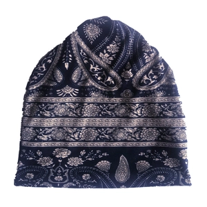 Detailed view of dark blue paisley pattern on soft knit cotton beanies for women