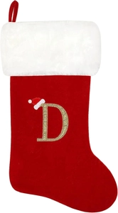 Detail of red Christmas stocking featuring a golden glitter letter D and plush white cuff