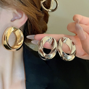 Minimalist large twisted oval geometric metal stud earrings in gold and silver finish