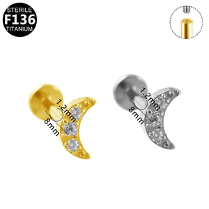 Titanium moon-shaped lip stud piercing with three sparkling zircon stones in gold finish