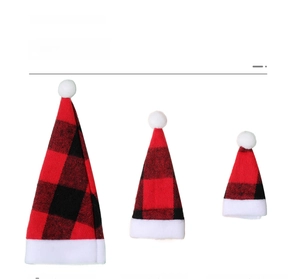 Three red and black buffalo plaid mini Christmas hats for bottle and cutlery decoration