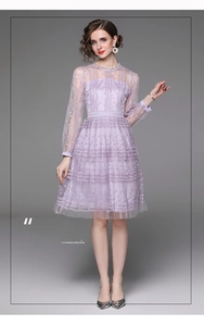 Detailed view of purple layered lace mesh dress with exquisite floral embroidery
