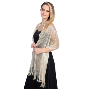Detail of gold metallic thread shawl with elegant long fringe for evening gowns