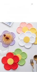 Detail of colorful cherry blossom silicone heat mats with non-slip petal textures