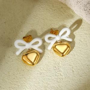 Elegant 18K gold-plated stainless steel earrings with white bows and heart charms