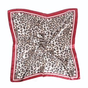 Classic leopard print satin square scarf with red border on white background