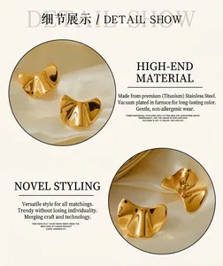 Detail of 18k gold plated stainless steel earrings with irregular wavy texture