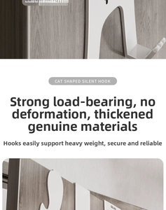 White cat shaped over door hook detail showing 2mm gap requirement and sturdy metal design