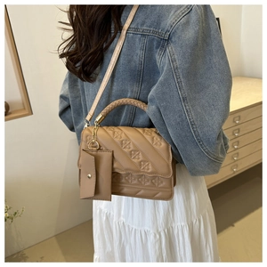 Khaki geometric quilted crossbody bag with braided handle and matching mini coin purse