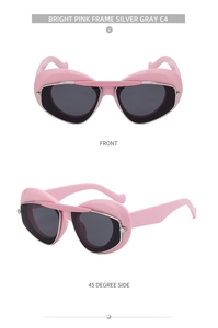 Detailed front and side view of pink heart-shaped cat eye sunglasses with silver lenses