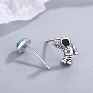 Cute asymmetric astronaut and blue planet stud earrings with shiny zircon accents