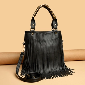 Elegant black fringe handbag with gold chain handle and adjustable shoulder strap