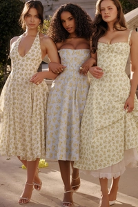 French style floral summer midi dresses with waist cinching and delicate yellow prints