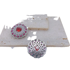 Copper plated zircon pendant with ruby gemstone and hollow floral silver base