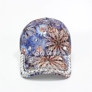 Close-up of colorful floral baseball cap with sparkling rhinestones and crown detail