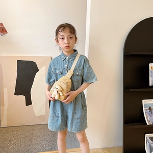 Kids woven straw crossbody bag with cute white teddy bear charm and light beige texture