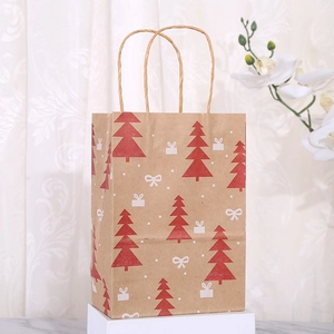Brown kraft paper Christmas gift bag with red tree and white gift box print on white block
