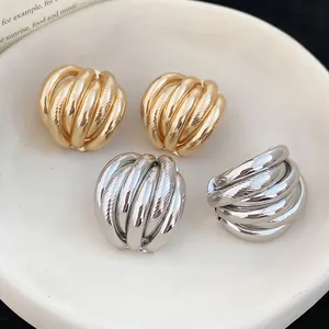 Minimalist layered textured stud earrings in gold and silver finish for women