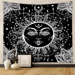 Detailed macro view of the bohemian sun and moon tapestry with occult mystic symbols