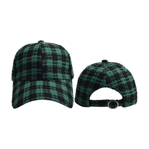 Detail of green houndstooth baseball cap with a metal adjustable ring buckle back