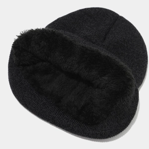 Black knitted winter hat with thick fleece lining for warmth and outdoor cycling protection