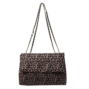 Leopard print crossbody bag with gold chain strap and stylish flap closure on white background