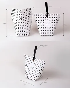 Polka dot paper gift bag with ribbon and thank you sticker including size details