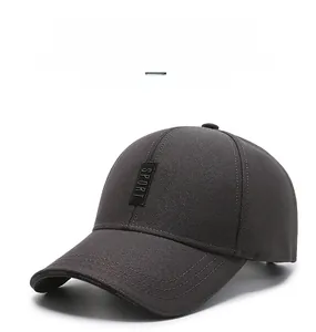 Detailed view of dark grey sport baseball cap with embroidered SPORT logo and brim text