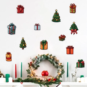 Christmas wall stickers featuring colorful cartoon trees and gift boxes on a white wall