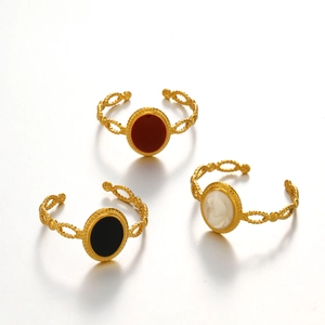 Minimalist oval rings in red black and white colors with gold braided adjustable bands