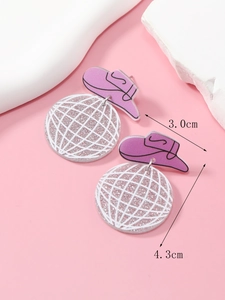 Detail of pink acrylic disco cowboy hat earrings with size markers 3.0cm and 4.3cm
