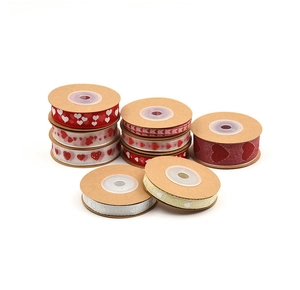 Rolls of colorful heart pattern ribbons for DIY wedding gift wrapping and craft supplies
