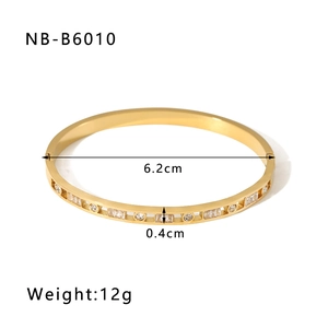 Detailed view of 18K gold plated zircon bangle with precise size measurement markings