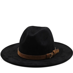 Detail of black fedora hat with brown suede belt and vintage bronze buckle