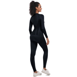 Close-up of seamless black yoga set with specialized compression zones on back and waist