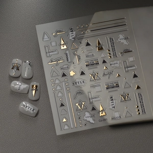 Gold foil geometric nail stickers with abstract lines and metallic foil art finish