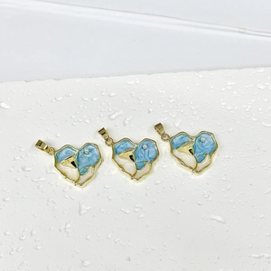 Vintage heart pendant with blue floral enamel, faux pearl, and gold metal frame set