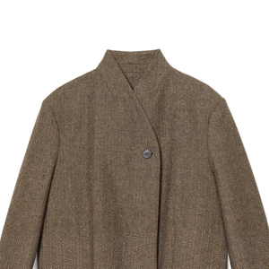 Women's brown herringbone wool coat with textured fabric and vintage resin button detail