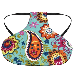 Close-up of printed poultry hen saddle with blue paisley canvas and elastic straps