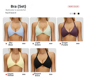 Detail of twisted front halter yoga bras in blue, green, purple, yellow, and black colors