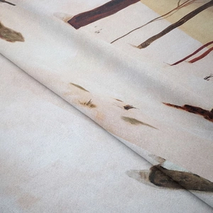 Close-up of soft flannel tapestry fabric texture with abstract nature landscape print
