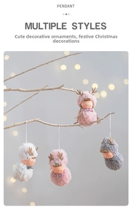 Plush Christmas dolls with reindeer antlers and plaid bows hanging on festive branches
