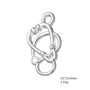 Macro shot of silver stethoscope charm pendant with 13x23.4mm size and 1.55g weight info