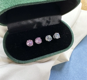 Classic 4-prong silver studs set with 6mm pink and clear zircon in a green velvet box