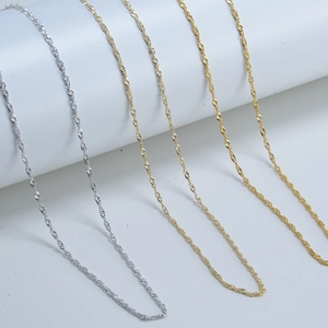 Detail of S925 sterling silver twisted water wave chains in silver, gold and rose gold