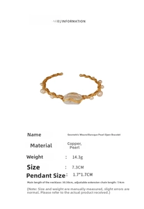 Detail of gold-plated geometric wire wrapped bracelet featuring large baroque pearl