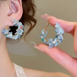 Silver needle hoop earrings with irregular natural blue stones and white pearls