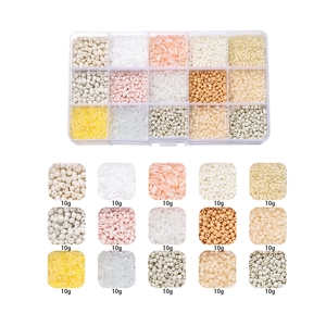 Macro detail of 15-grid glass seed bead kit showing multi-color DIY jewelry craft beads