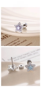 Macro detail of star-shaped stud earrings with micro-set blue and purple zircon crystals