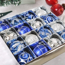 Close-up of 16-piece blue and silver Christmas ball ornaments with glitter details